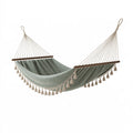 Amaca 300 x 100 cm in cotone verde con barre in legno - sospesa con frange